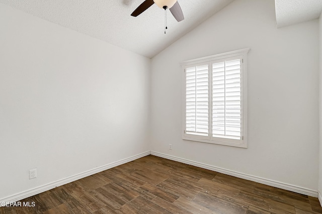 3400 Buffalo Soldier Cir, El Paso, TX 79936 - spare room featuring ceiling fan, dark wood-type flooring, lofted ceiling, baseboards, and a textured ceiling