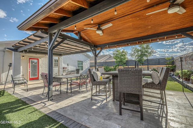 14837 Tierra Crystal Ave, El Paso, TX 79938 - view of patio featuring ceiling fan, outdoor dining area, and a fenced backyard