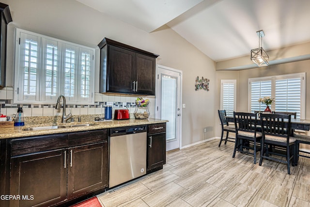 14837 Tierra Crystal Ave, El Paso, TX 79938 - kitchen featuring dishwasher, a sink, vaulted ceiling, backsplash, and dark brown cabinets