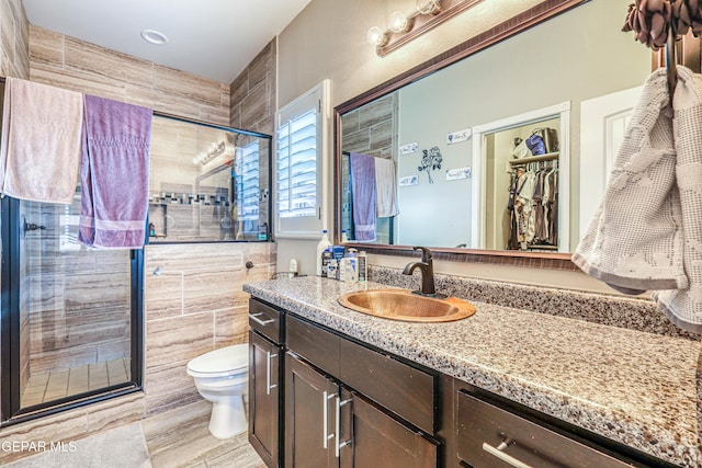 14837 Tierra Crystal Ave, El Paso, TX 79938 - full bath featuring a stall shower, toilet, vanity, and wood finished floors