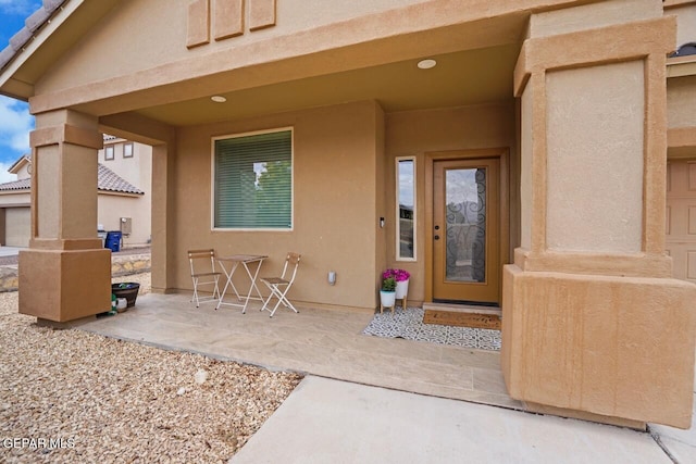 5525 Valley Cedar Dr, El Paso, TX 79932 - view of exterior entry featuring a patio area and stucco siding