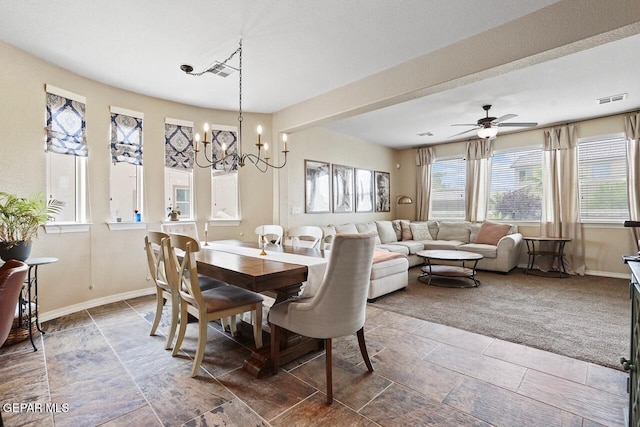 5525 Valley Cedar Dr, El Paso, TX 79932 - dining room featuring baseboards, a chandelier, a ceiling fan, and stone finish flooring