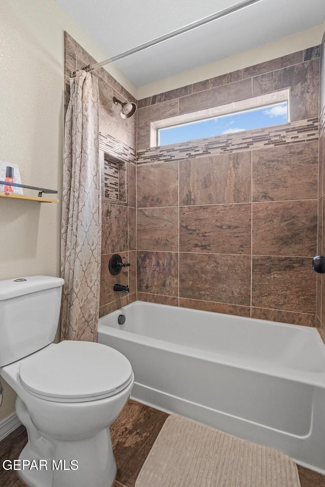 5525 Valley Cedar Dr, El Paso, TX 79932 - full bathroom with shower / bathtub combination with curtain, toilet, and wood finished floors