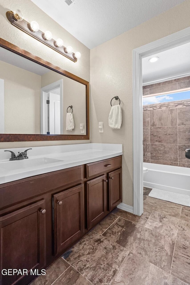5525 Valley Cedar Dr, El Paso, TX 79932 - full bathroom with vanity and shower / washtub combination