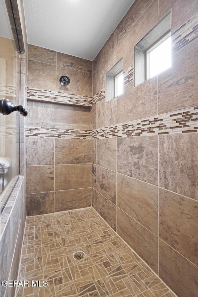 5525 Valley Cedar Dr, El Paso, TX 79932 - full bath with a tile shower