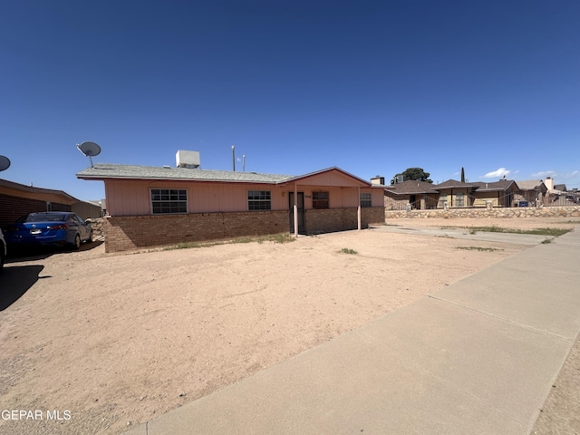 9846 Gifford Dr, El Paso, TX 79927 - view of front of home with brick siding and fence