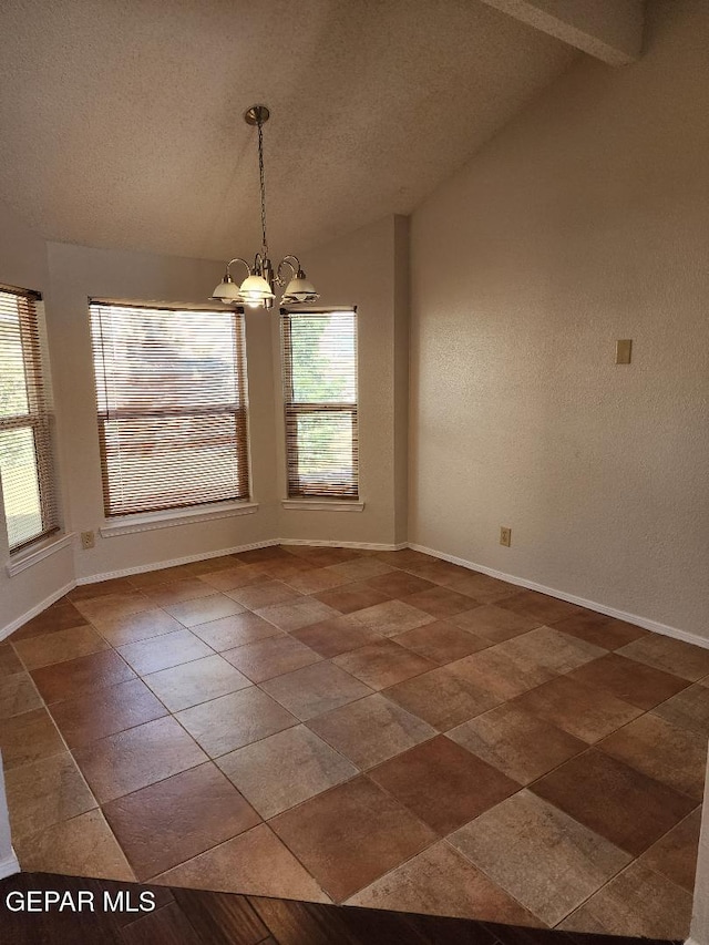 unfurnished dining area with vaulted ceiling, a chandelier, baseboards, and a textured ceiling
