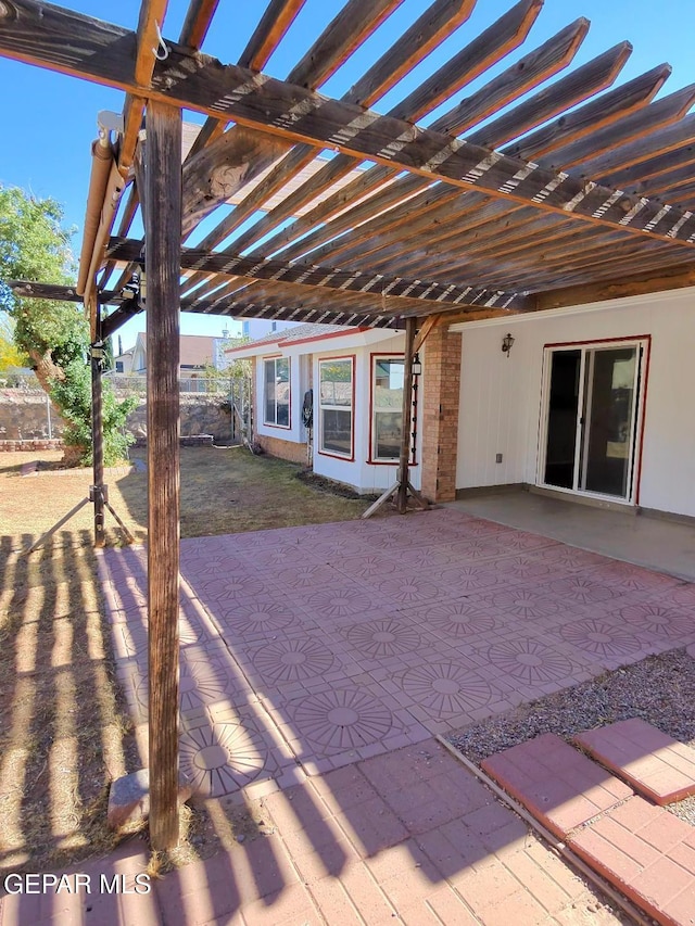 view of patio featuring a pergola