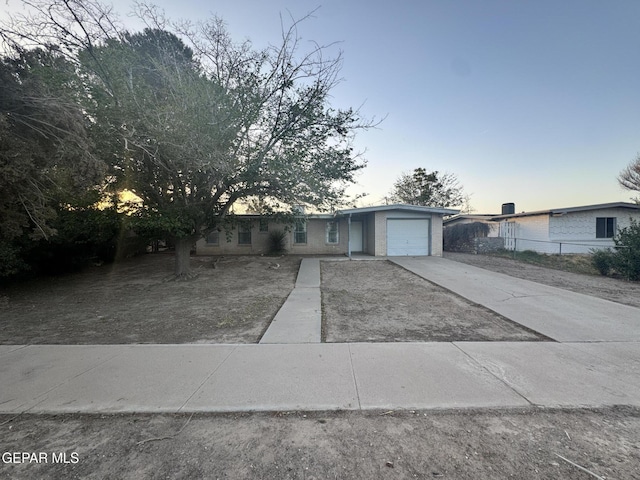 305 Corvena Way, El Paso, TX 79922 - single story home featuring concrete driveway, a garage, fence, and brick siding