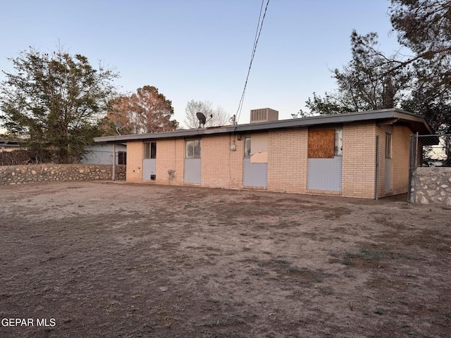 305 Corvena Way, El Paso, TX 79922 - back of house featuring brick siding and fence