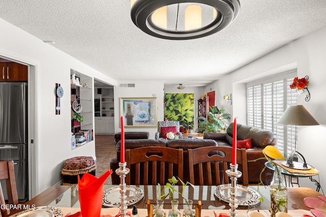 5051 Montoya Dr, El Paso, TX 79922 - dining room with a textured ceiling
