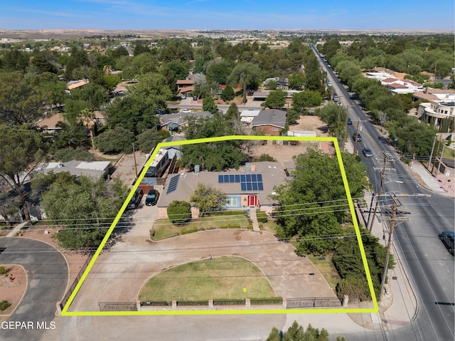 5051 Montoya Dr, El Paso, TX 79922 - aerial overview of property's location with property parcel outlined and a tree filled landscape