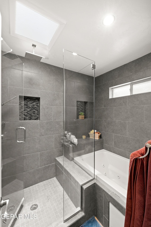 5051 Montoya Dr, El Paso, TX 79922 - bathroom featuring a stall shower, a whirlpool tub, and a skylight