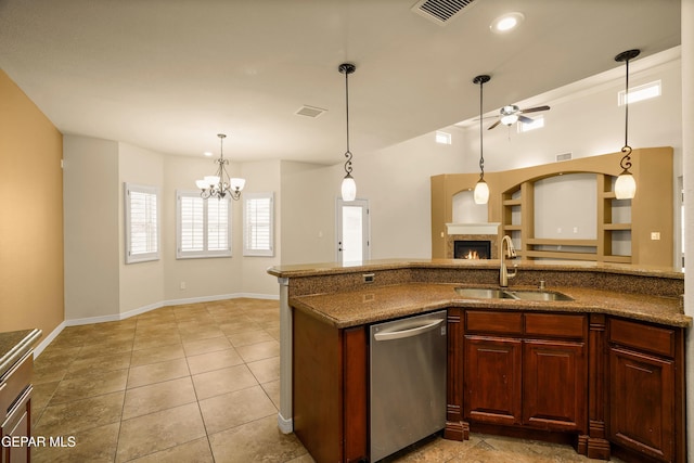 14117 Rainbow Point Dr, El Paso, TX 79938 - kitchen featuring stainless steel dishwasher, ceiling fan, open floor plan, a chandelier, and light tile patterned flooring