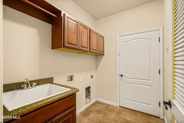 14117 Rainbow Point Dr, El Paso, TX 79938 - laundry area with washer hookup, cabinet space, hookup for an electric dryer, and light tile patterned floors