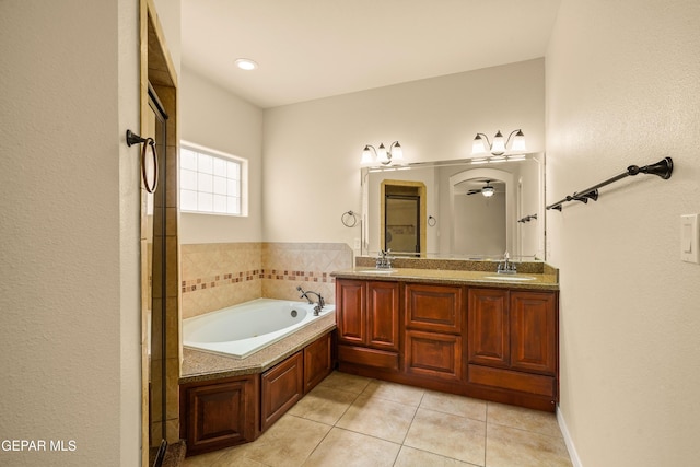 14117 Rainbow Point Dr, El Paso, TX 79938 - full bath featuring tile patterned floors, a bath, double vanity, and a ceiling fan
