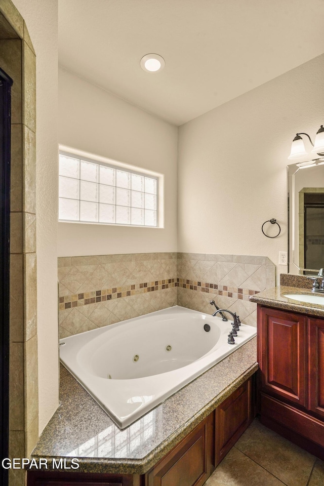 14117 Rainbow Point Dr, El Paso, TX 79938 - full bathroom with vanity, a jetted tub, and tile patterned flooring