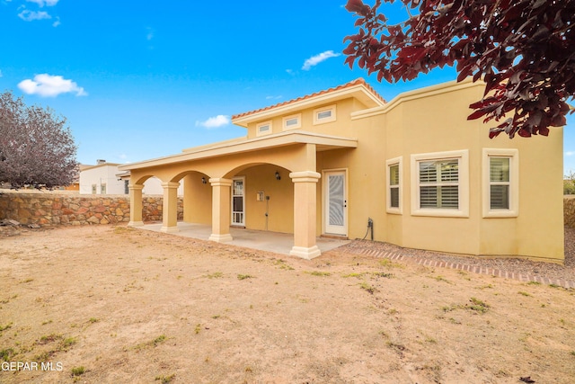 14117 Rainbow Point Dr, El Paso, TX 79938 - rear view of property with stucco siding and a patio