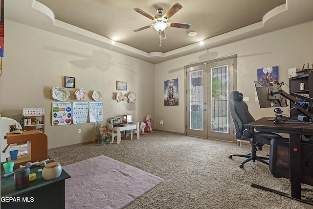 3089 Snowy Point Dr, El Paso, TX 79938 - office space featuring a tray ceiling, carpet, ceiling fan, and baseboards