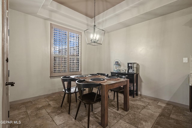 3089 Snowy Point Dr, El Paso, TX 79938 - dining area with a chandelier, baseboards, and stone tile flooring