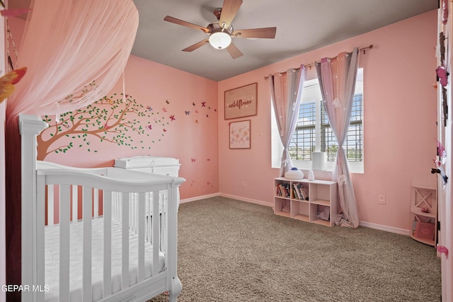 3089 Snowy Point Dr, El Paso, TX 79938 - bedroom featuring carpet flooring, a crib, baseboards, and a ceiling fan