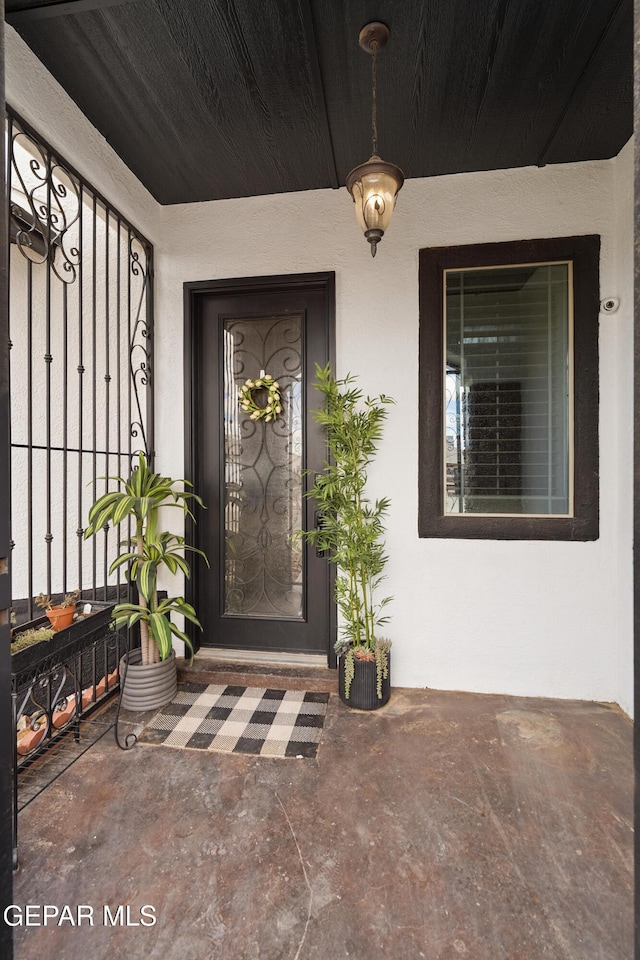 3089 Snowy Point Dr, El Paso, TX 79938 - property entrance featuring a porch and stucco siding