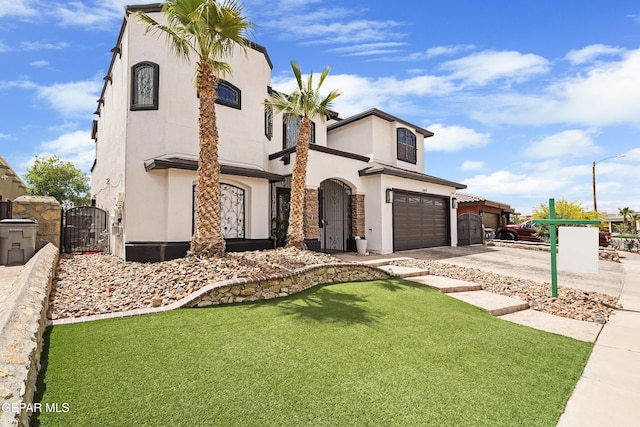 3089 Snowy Point Dr, El Paso, TX 79938 - view of front of property with a garage, a gate, driveway, stucco siding, and a front yard