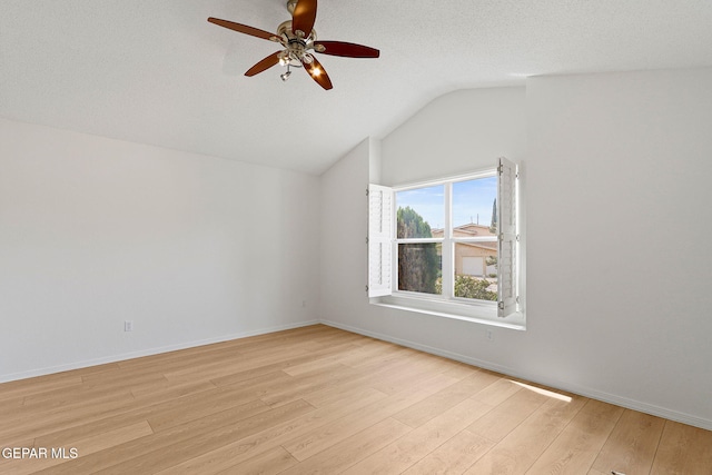 6140 Los Robles Dr, El Paso, TX 79912 - unfurnished room with a ceiling fan, light wood-type flooring, and lofted ceiling