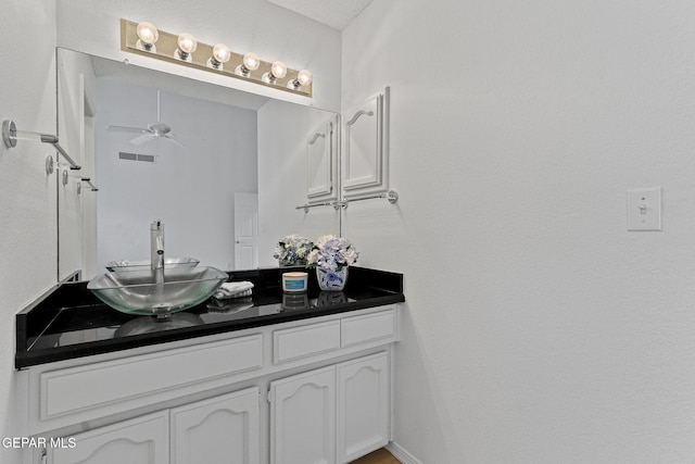 6140 Los Robles Dr, El Paso, TX 79912 - bathroom with vanity and a ceiling fan