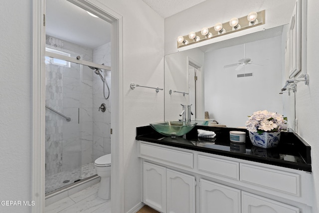 6140 Los Robles Dr, El Paso, TX 79912 - bathroom with marble finish floors, vanity, a marble finish shower, and ceiling fan