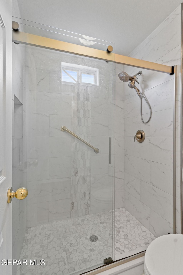 6140 Los Robles Dr, El Paso, TX 79912 - full bath featuring a stall shower