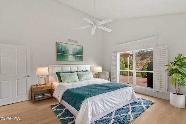 6140 Los Robles Dr, El Paso, TX 79912 - bedroom featuring high vaulted ceiling, wood finished floors, and ceiling fan