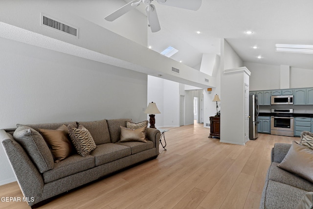 6140 Los Robles Dr, El Paso, TX 79912 - living room featuring a ceiling fan, light wood-style floors, high vaulted ceiling, and recessed lighting