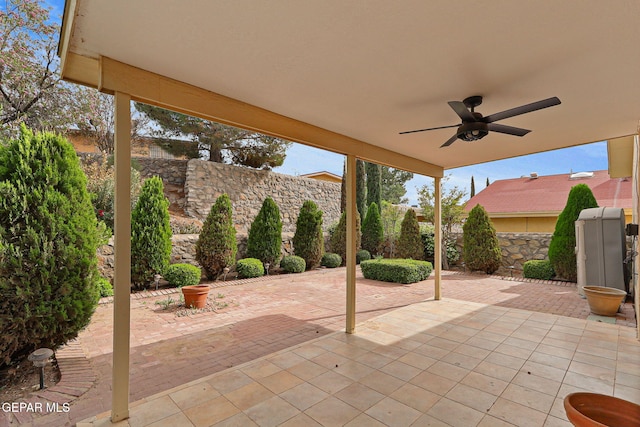 6140 Los Robles Dr, El Paso, TX 79912 - fenced backyard featuring a ceiling fan and a patio
