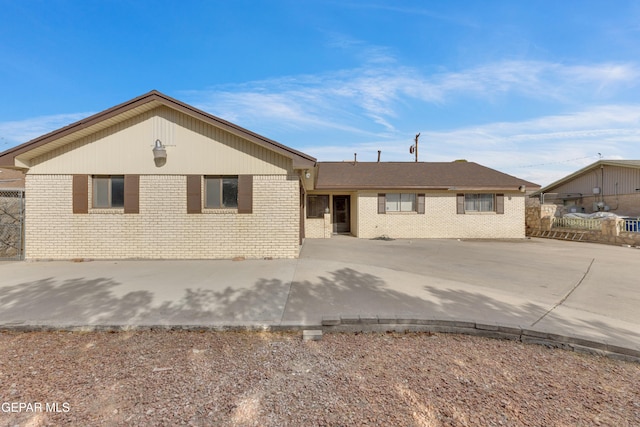 10125 Castletown Dr, El Paso, TX 79925 - single story home with brick siding and a patio area