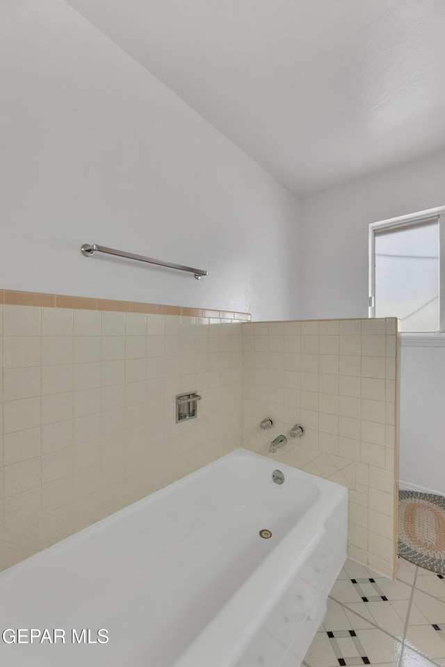 10125 Castletown Dr, El Paso, TX 79925 - full bath featuring a bath and tile patterned floors