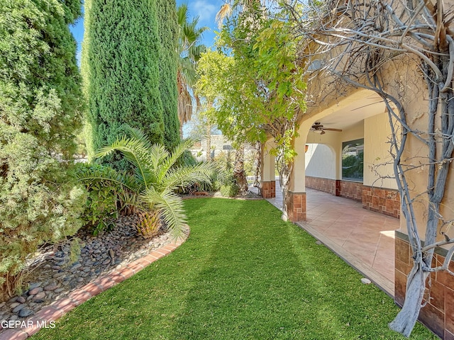 852 Cresta Alta Dr, El Paso, TX 79912 - view of grassy yard with a ceiling fan and a patio area