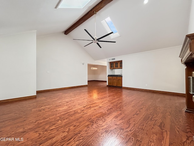852 Cresta Alta Dr, El Paso, TX 79912 - unfurnished living room with a skylight, beamed ceiling, ceiling fan, wood finished floors, and a fireplace