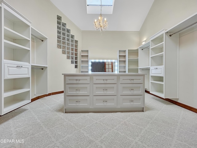 852 Cresta Alta Dr, El Paso, TX 79912 - walk in closet featuring a chandelier, light carpet, and vaulted ceiling