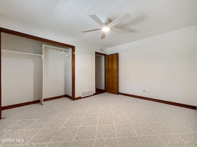 852 Cresta Alta Dr, El Paso, TX 79912 - unfurnished bedroom with a closet, light carpet, baseboards, and a ceiling fan