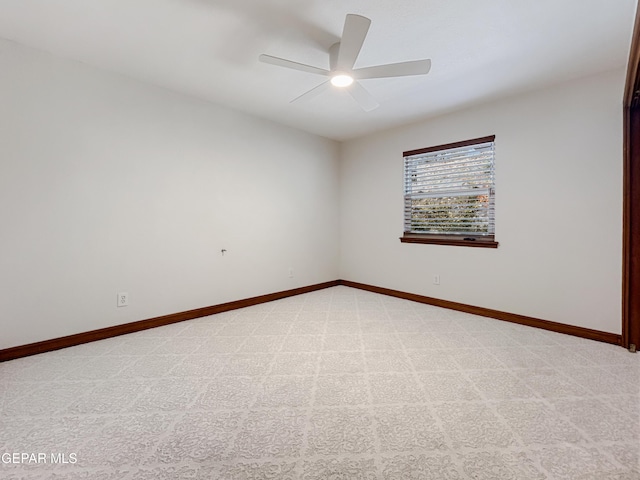 852 Cresta Alta Dr, El Paso, TX 79912 - unfurnished room featuring light carpet, ceiling fan, and baseboards
