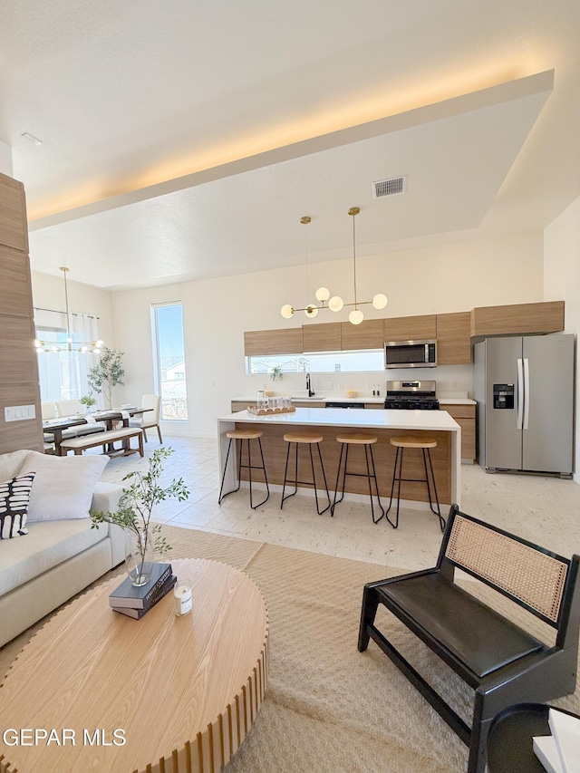 15101 Steer Dr, El Paso, TX 79938 - living area featuring a chandelier