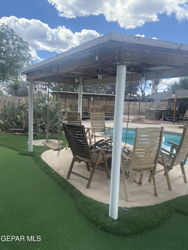 view of patio / terrace featuring a gazebo and a fenced backyard
