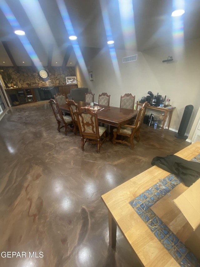 dining space with concrete floors