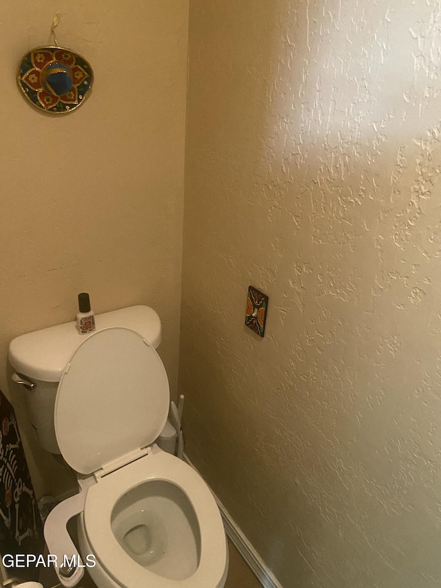bathroom featuring toilet