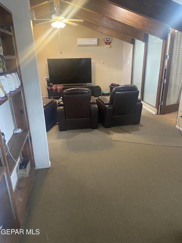carpeted home theater featuring an AC wall unit, a ceiling fan, and vaulted ceiling