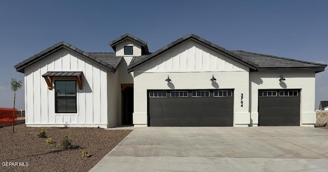 3764 Chart Pl, El Paso, TX 79938 - modern farmhouse with board and batten siding and a garage