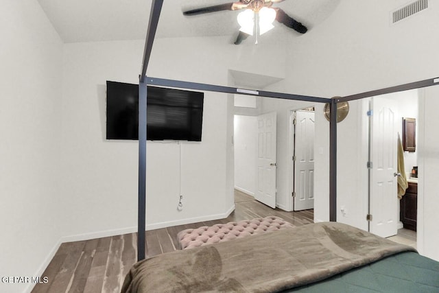 4729 Joseph Rodriguez Dr, El Paso, TX 79938 - bedroom featuring wood finished floors, baseboards, and high vaulted ceiling