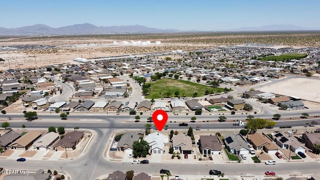 4729 Joseph Rodriguez Dr, El Paso, TX 79938 - aerial view of property's location with a mountainous background and nearby suburban area