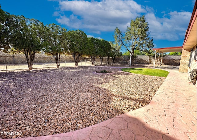 3100 Hector Dr, El Paso, TX 79935 - fenced backyard featuring a patio area